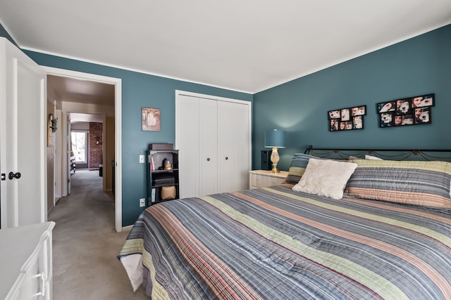 carpeted bedroom with a closet