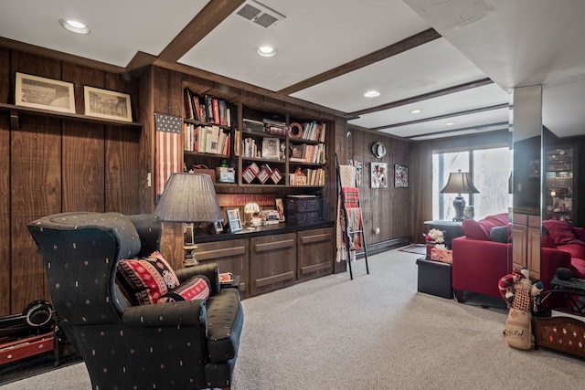 interior space featuring recessed lighting, visible vents, wood walls, and carpet