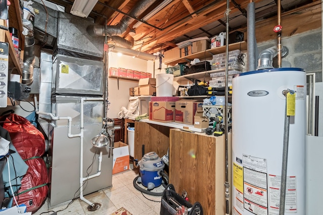 utility room with heating unit and water heater