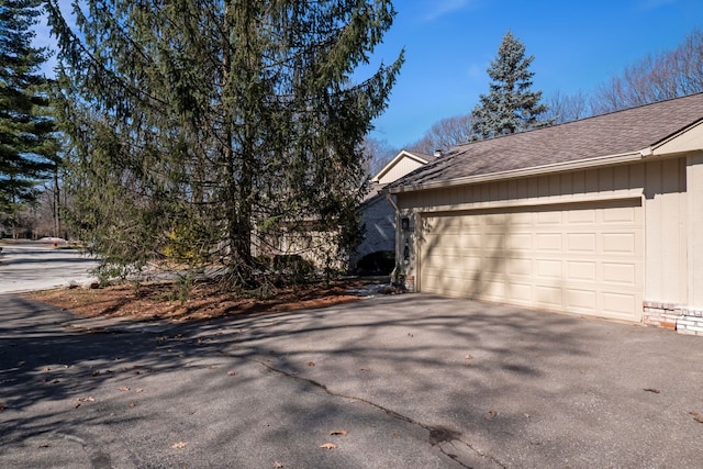 garage with driveway