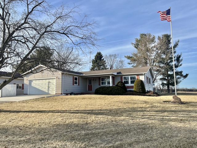 single story home featuring a garage, driveway, and a front lawn