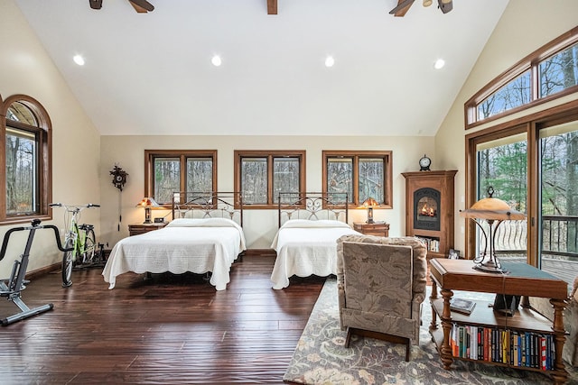 bedroom with access to exterior, high vaulted ceiling, recessed lighting, and hardwood / wood-style flooring
