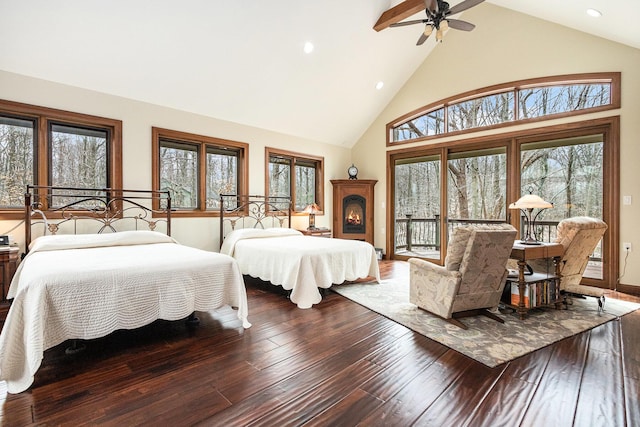 bedroom featuring high vaulted ceiling, recessed lighting, access to outside, and hardwood / wood-style flooring