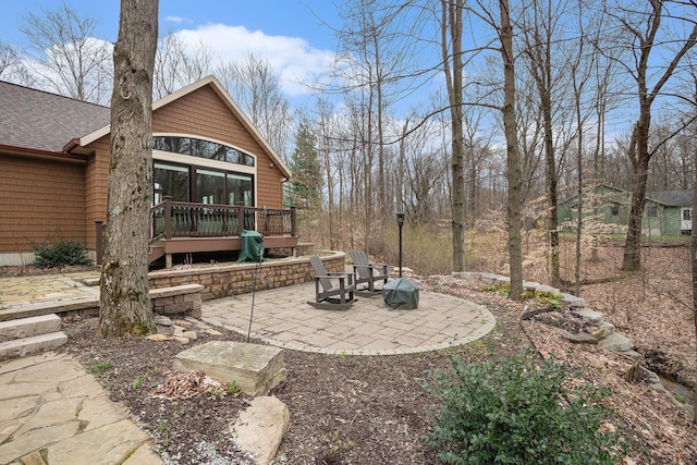 view of yard with a patio area and a deck
