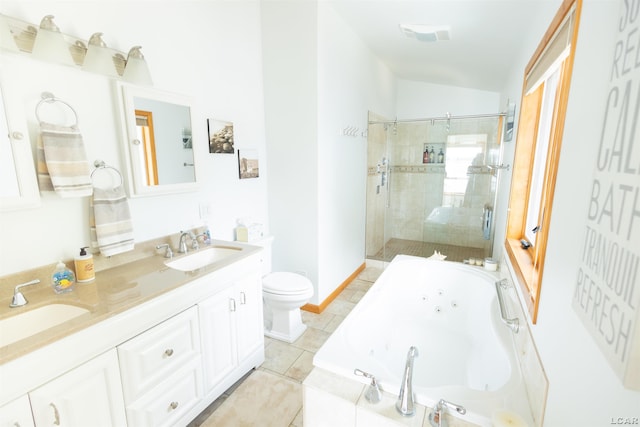 bathroom with tile patterned floors, a tub with jets, a shower stall, and a sink