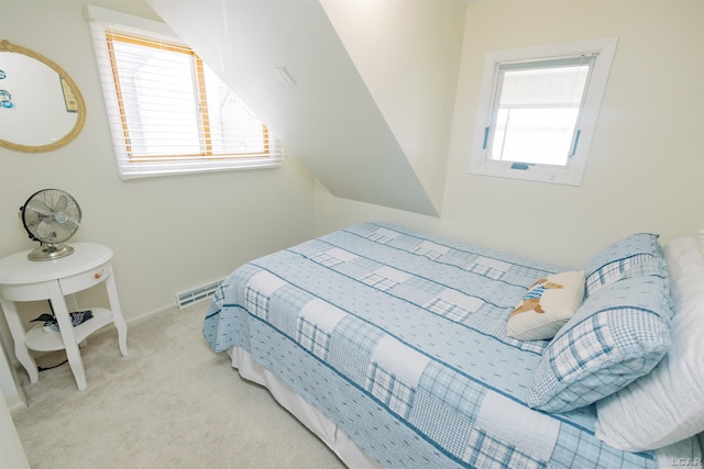 bedroom featuring visible vents, carpet floors, and baseboards