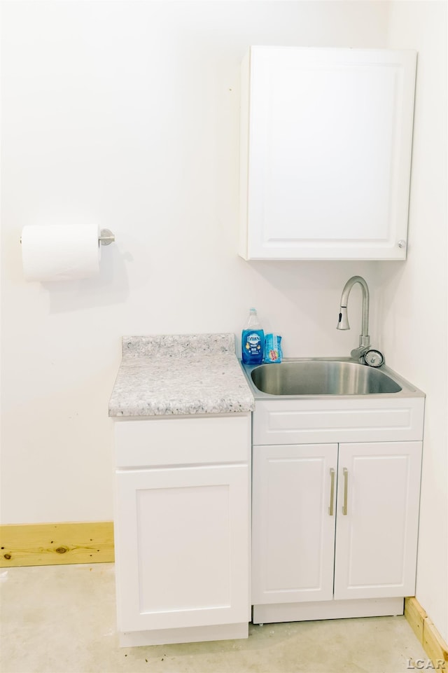 laundry room featuring a sink