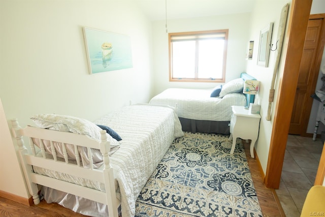 bedroom featuring tile patterned flooring