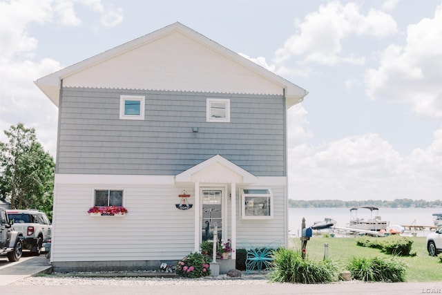 traditional-style house with a water view