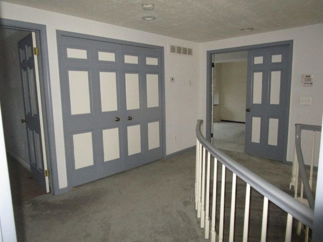 hallway with visible vents