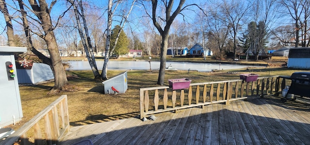 deck featuring a water view