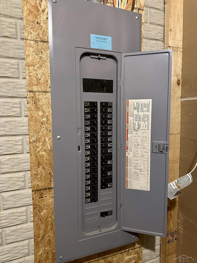 utility room featuring electric panel