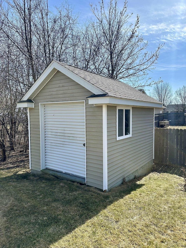 garage featuring fence