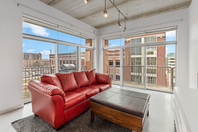 sunroom / solarium with a city view