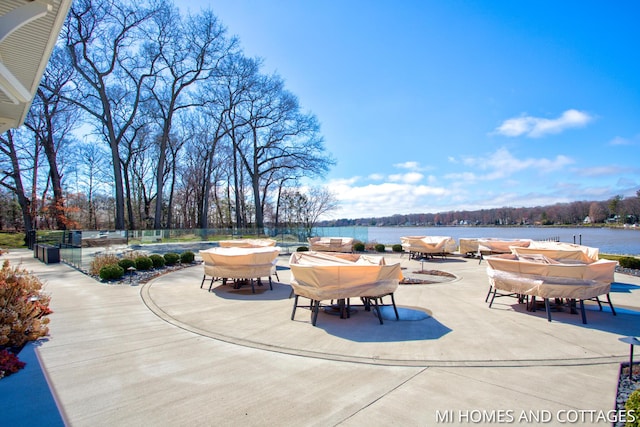 view of patio / terrace featuring a water view