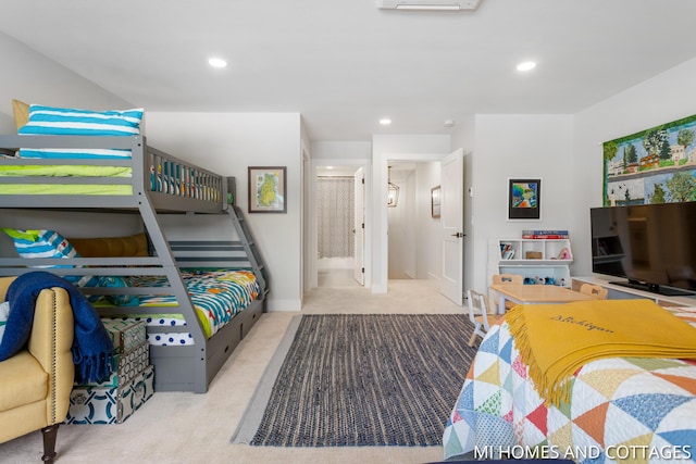 bedroom with recessed lighting and carpet floors