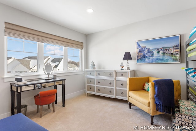 interior space with recessed lighting, light colored carpet, and baseboards