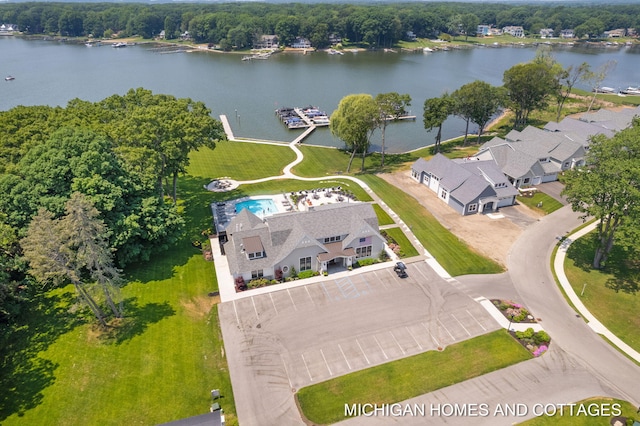 aerial view featuring a residential view and a water view