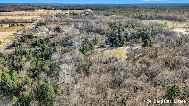 bird's eye view featuring a rural view and a forest view