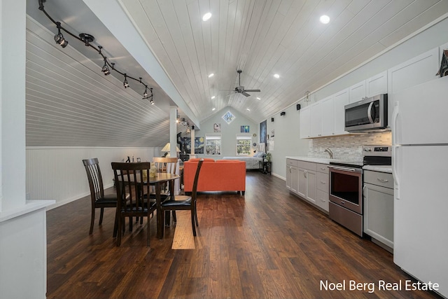 dining room featuring dark wood finished floors, recessed lighting, ceiling fan, vaulted ceiling, and wood ceiling