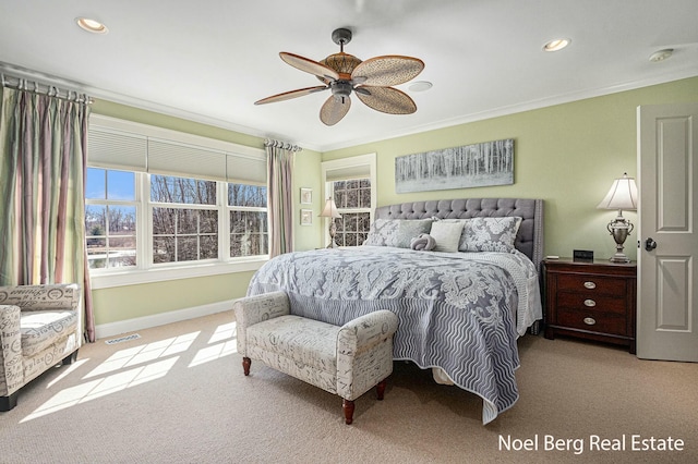 bedroom with visible vents, carpet, and crown molding