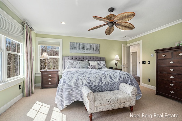 bedroom with baseboards, light colored carpet, ornamental molding, and a ceiling fan