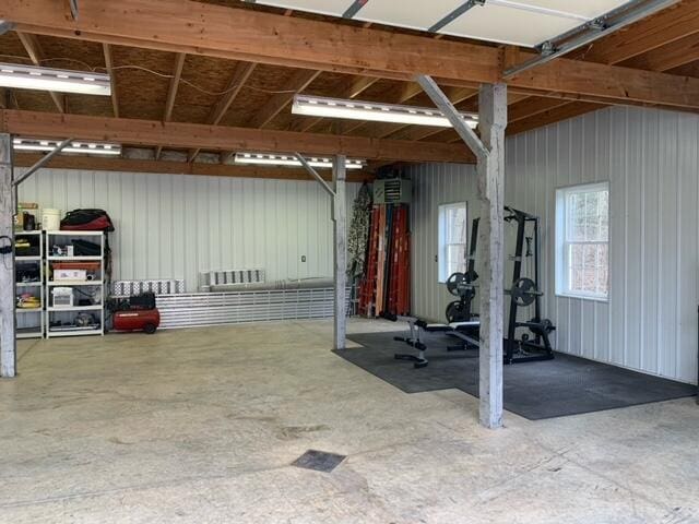 interior space featuring metal wall and a garage