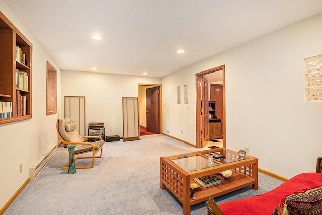 living room featuring recessed lighting, a baseboard radiator, baseboards, and carpet