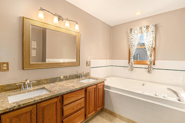 full bath featuring a bath, double vanity, and a sink