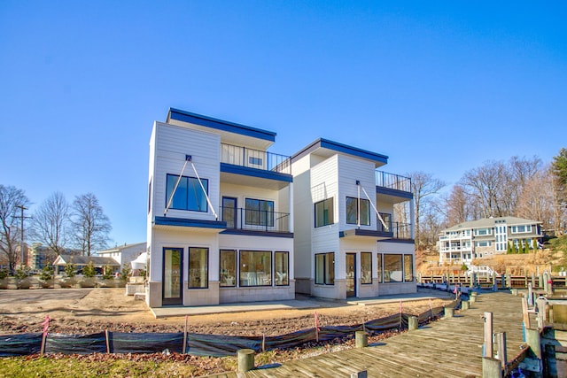 1 N Bailey Ave # 1, South Haven, MI 49090 - rear view of house with a balcony