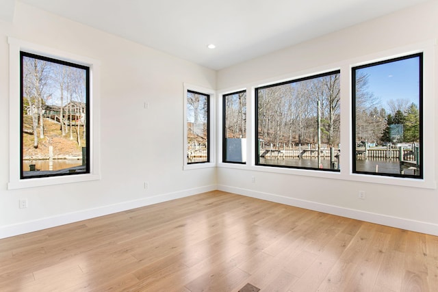 1 N Bailey Ave # 1, South Haven, MI 49090 - spare room with plenty of natural light, baseboards, and recessed lighting