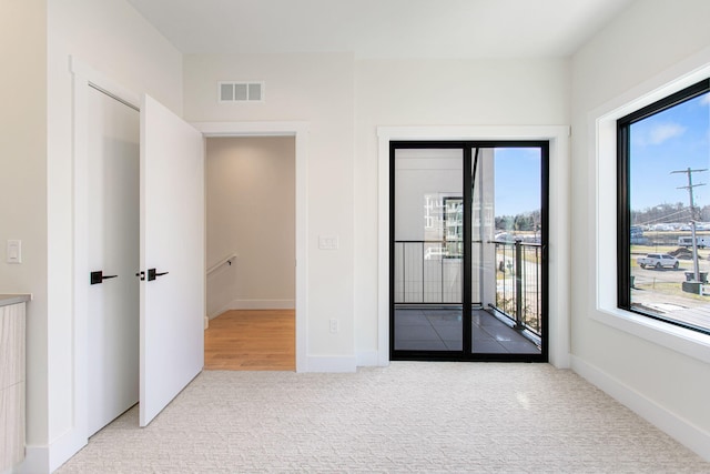 1 N Bailey Ave # 1, South Haven, MI 49090 - unfurnished room featuring carpet flooring and baseboards