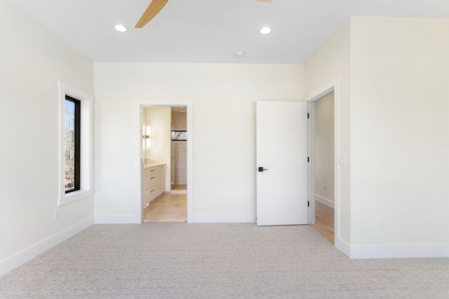 1 N Bailey Ave # 1, South Haven, MI 49090 - unfurnished bedroom featuring light colored carpet, recessed lighting, baseboards, connected bathroom, and a ceiling fan