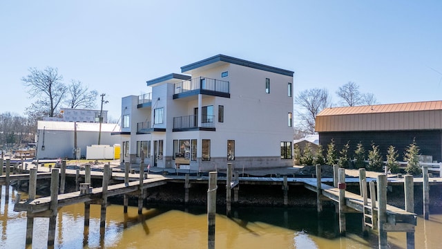 1 N Bailey Ave # 1, South Haven, MI 49090 - dock area featuring a balcony and a water view