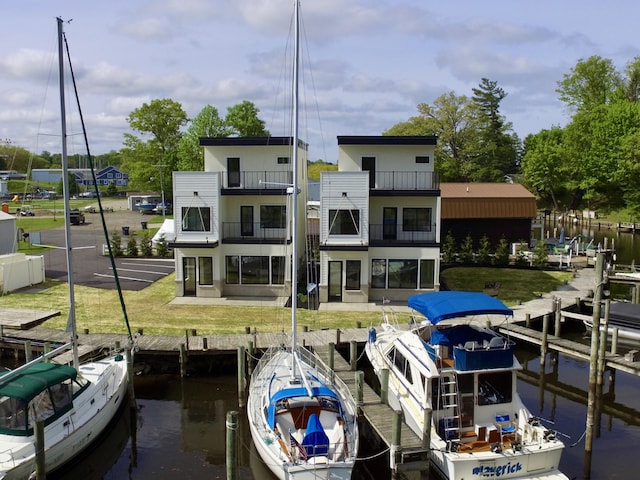 1 N Bailey Ave # 1, South Haven, MI 49090 - dock area with a water view and a balcony