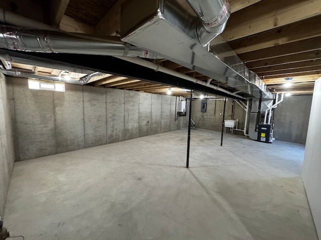 520 E Evelyn Ave, Hazel Park, MI 48030 - basement featuring heating unit, electric panel, and a sink