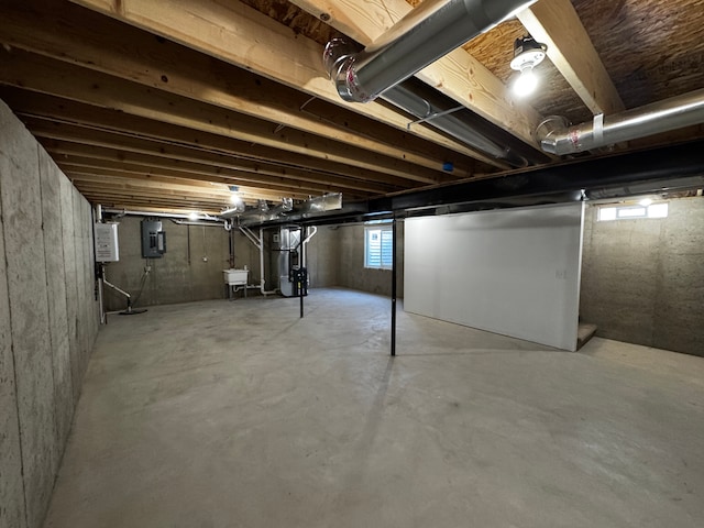520 E Evelyn Ave, Hazel Park, MI 48030 - below grade area with electric panel, heating unit, and a sink