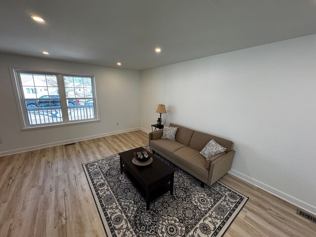 520 E Evelyn Ave, Hazel Park, MI 48030 - living area with recessed lighting, visible vents, baseboards, and light wood-style floors