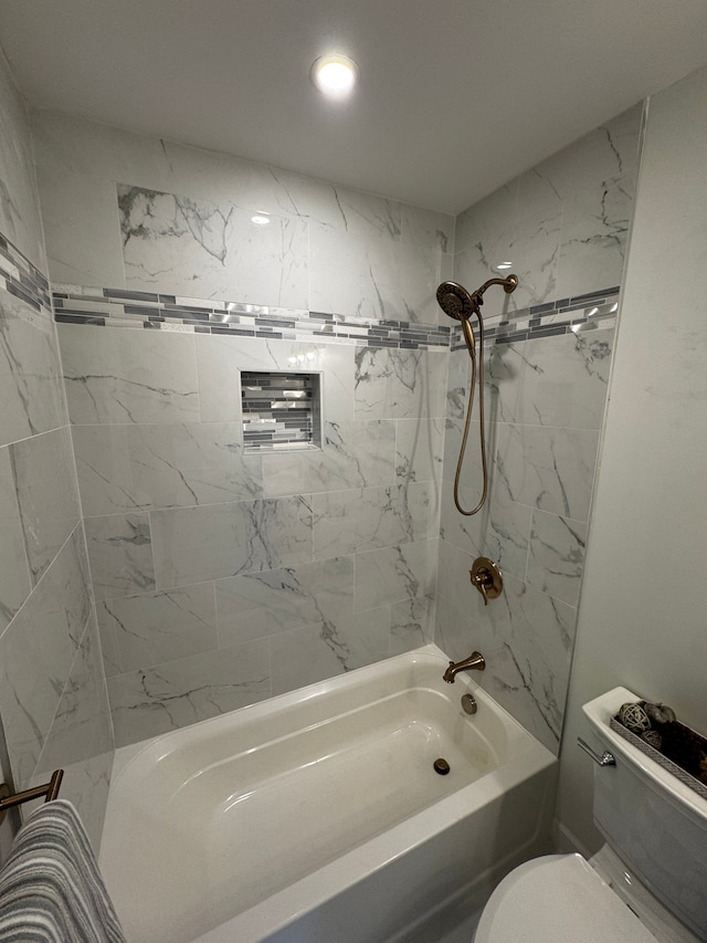 full bathroom featuring shower / bathing tub combination and toilet