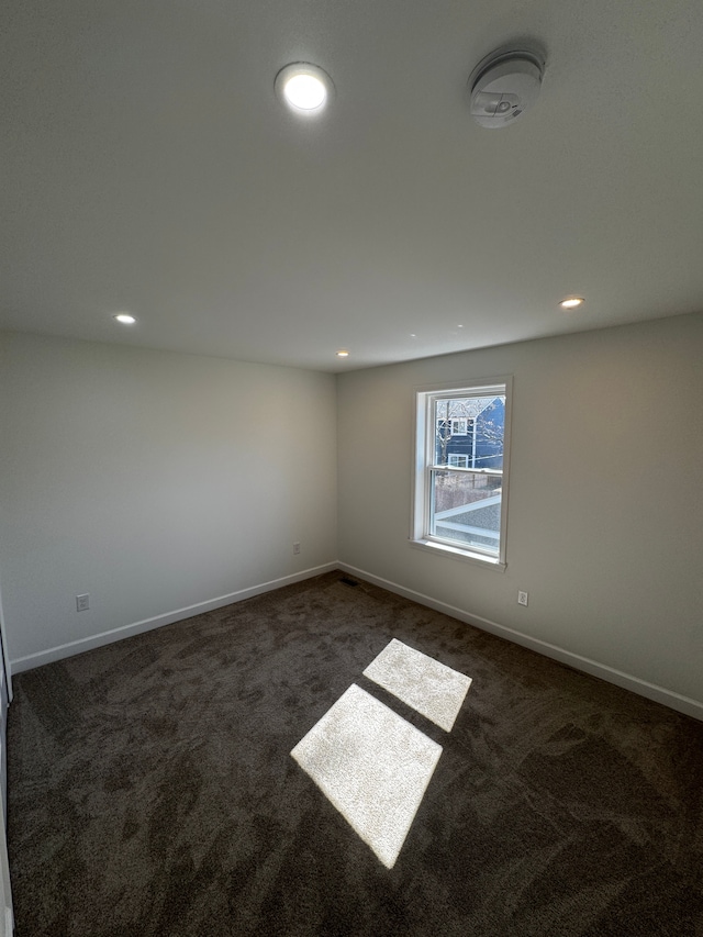 unfurnished room with recessed lighting, baseboards, and carpet flooring