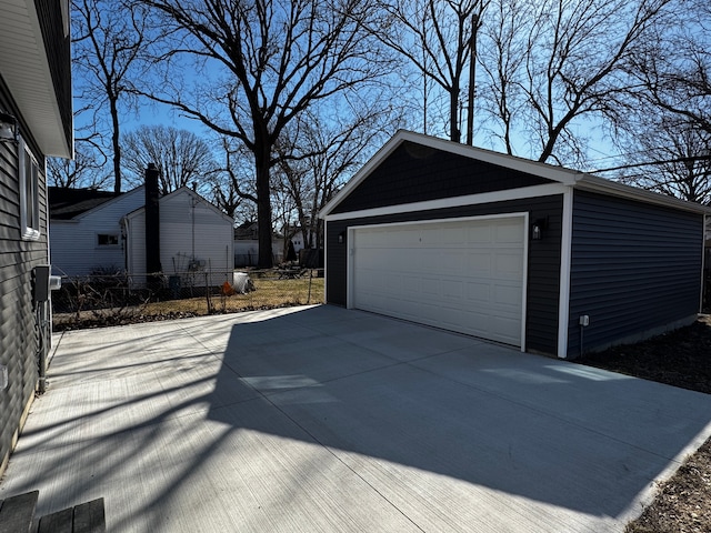 detached garage with fence