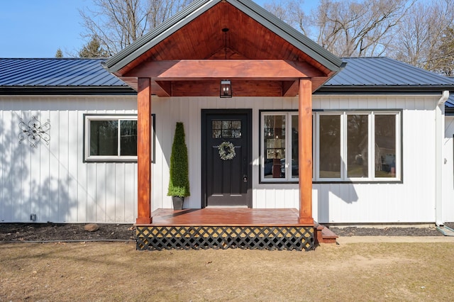 property entrance featuring metal roof