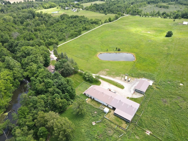 aerial view featuring a rural view and a water view