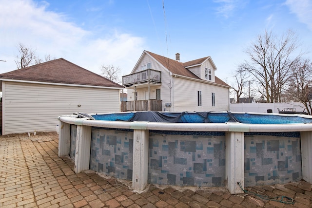 view of swimming pool featuring fence and a fenced in pool