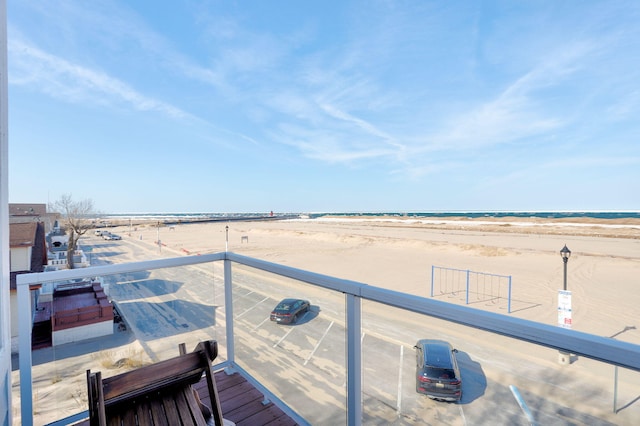 balcony with a view of the beach