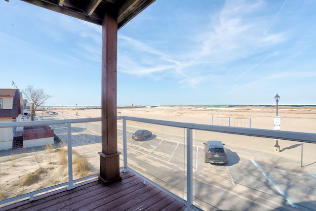 deck with a beach view