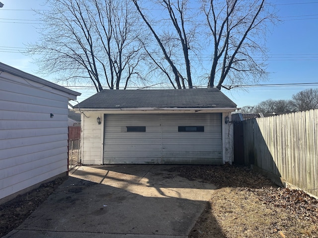 detached garage with fence