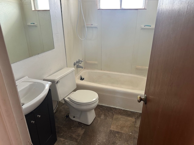 bathroom featuring a wealth of natural light, toilet, bathtub / shower combination, and vanity