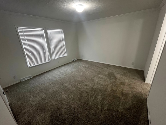 unfurnished bedroom with visible vents, crown molding, baseboards, carpet floors, and a textured ceiling