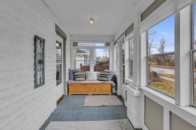 sunroom with wooden ceiling